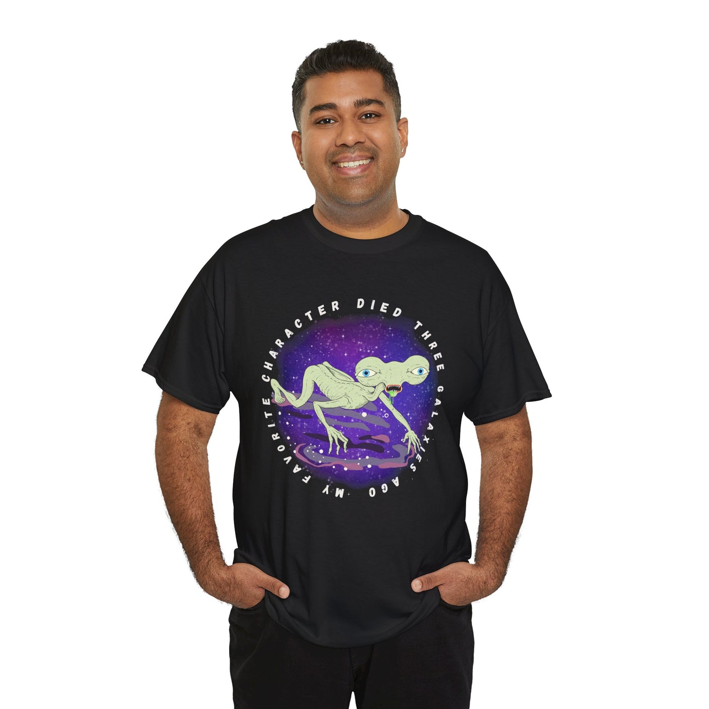 Man waring a black t-shirt with sickly alien crawling on it's knees and text 'My Favorite Character Died Three Galaxies Ago' 
