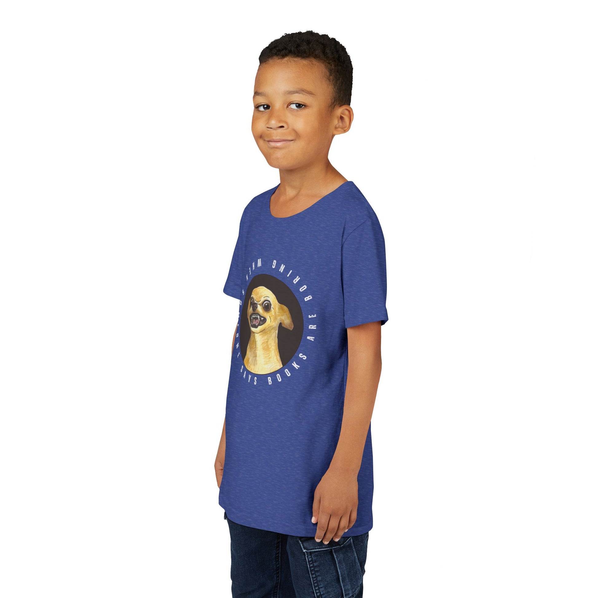 Boy wearing a blue t-shirt with a growling chihuahua graphic and text 'When Someone Says Books Are Boring'