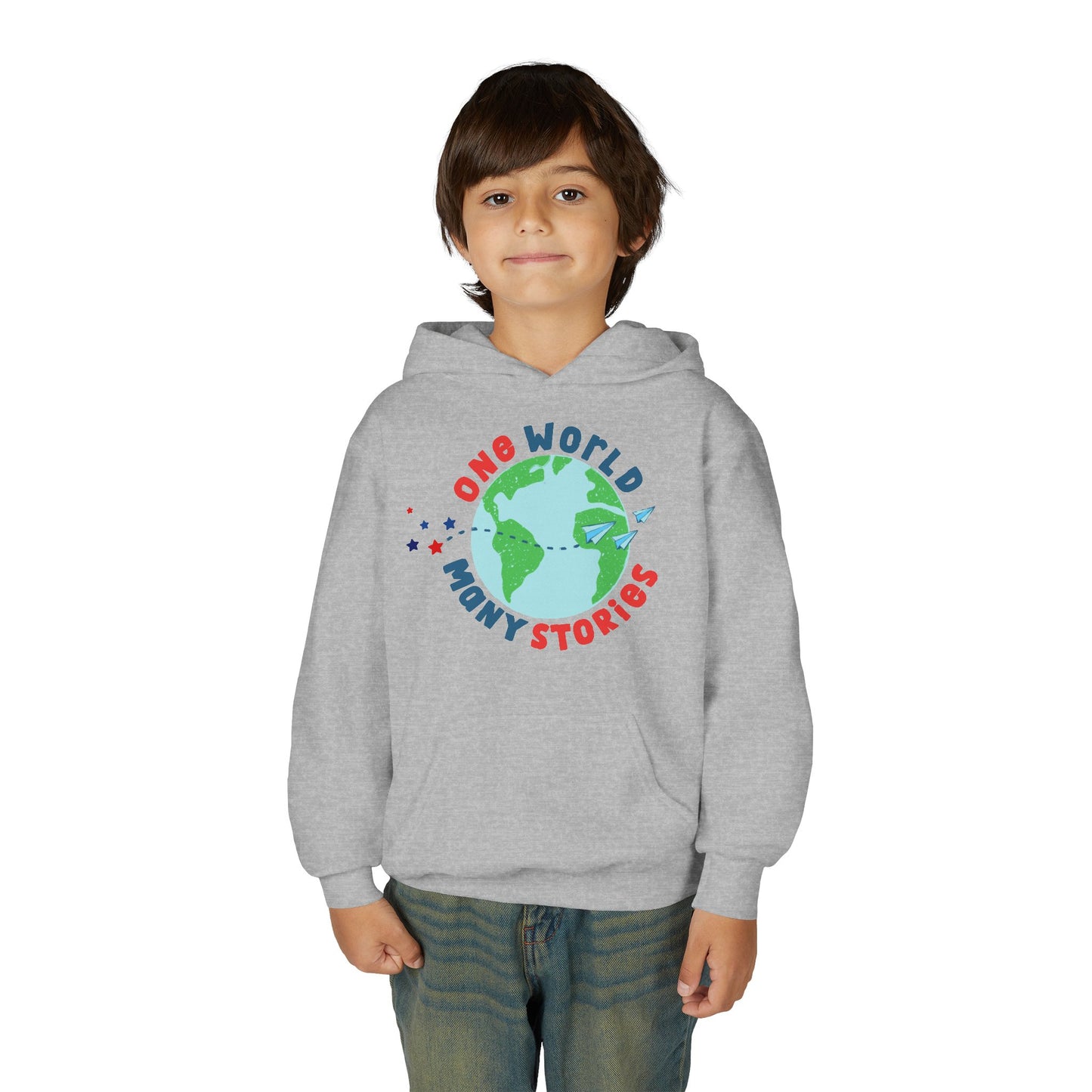 Boy wearing a gray hoodie with a graphic of the Earth and 'One World Many Stories' text 