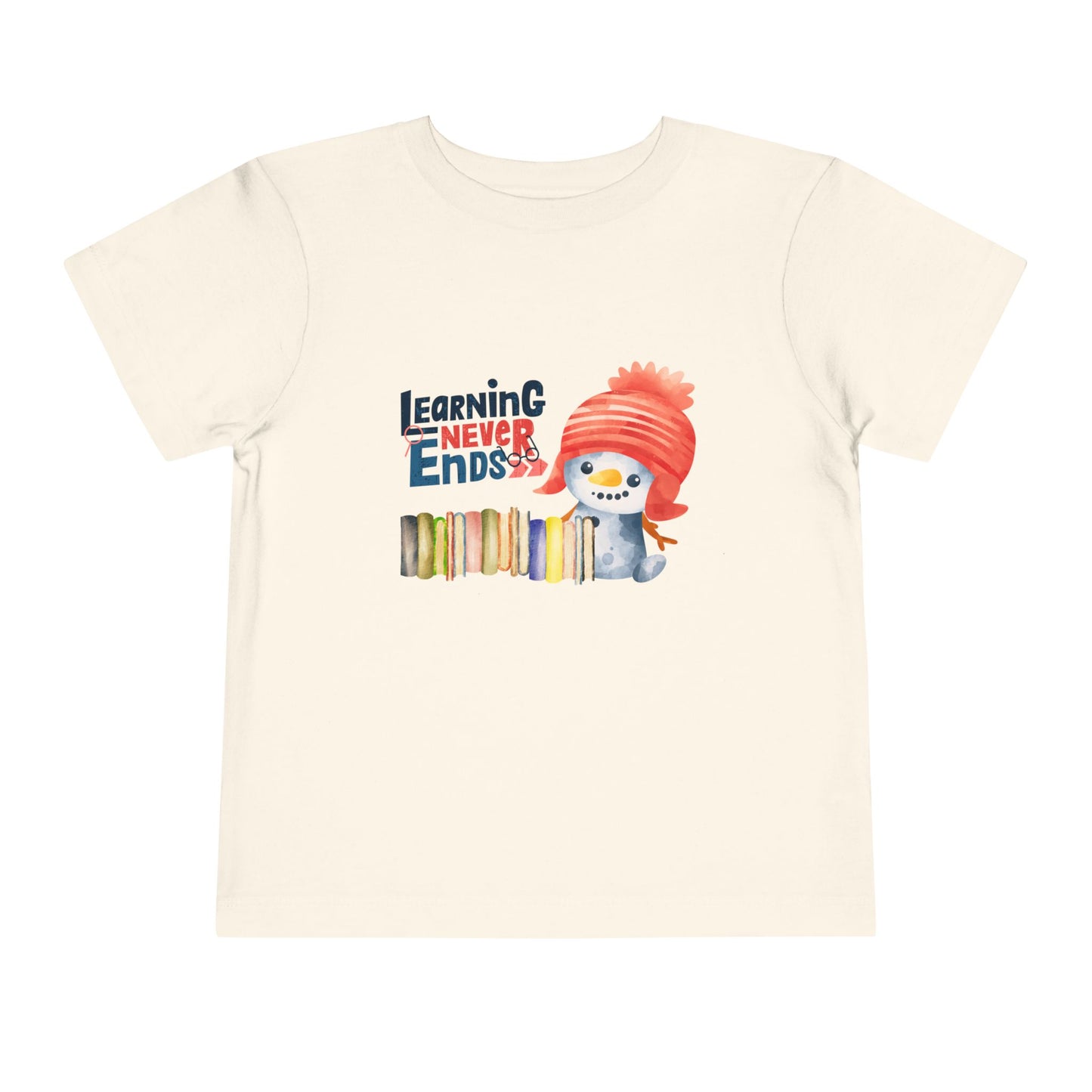 Beige toddler t-shirt with a snowman, a row of books and 'Learning Never Ends' text on a white background