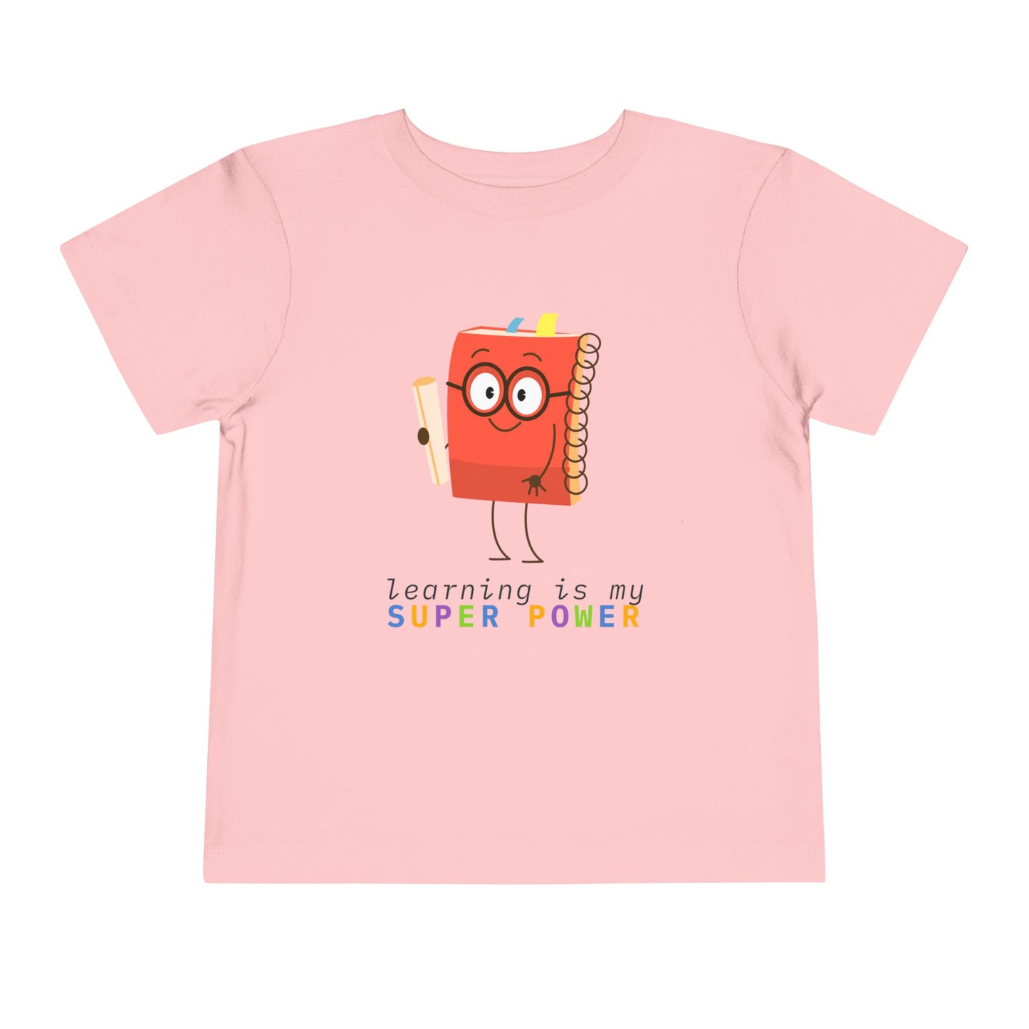 Pink toddler t-shirt with a cartoon book character and colorful 'learning is my super power' text 