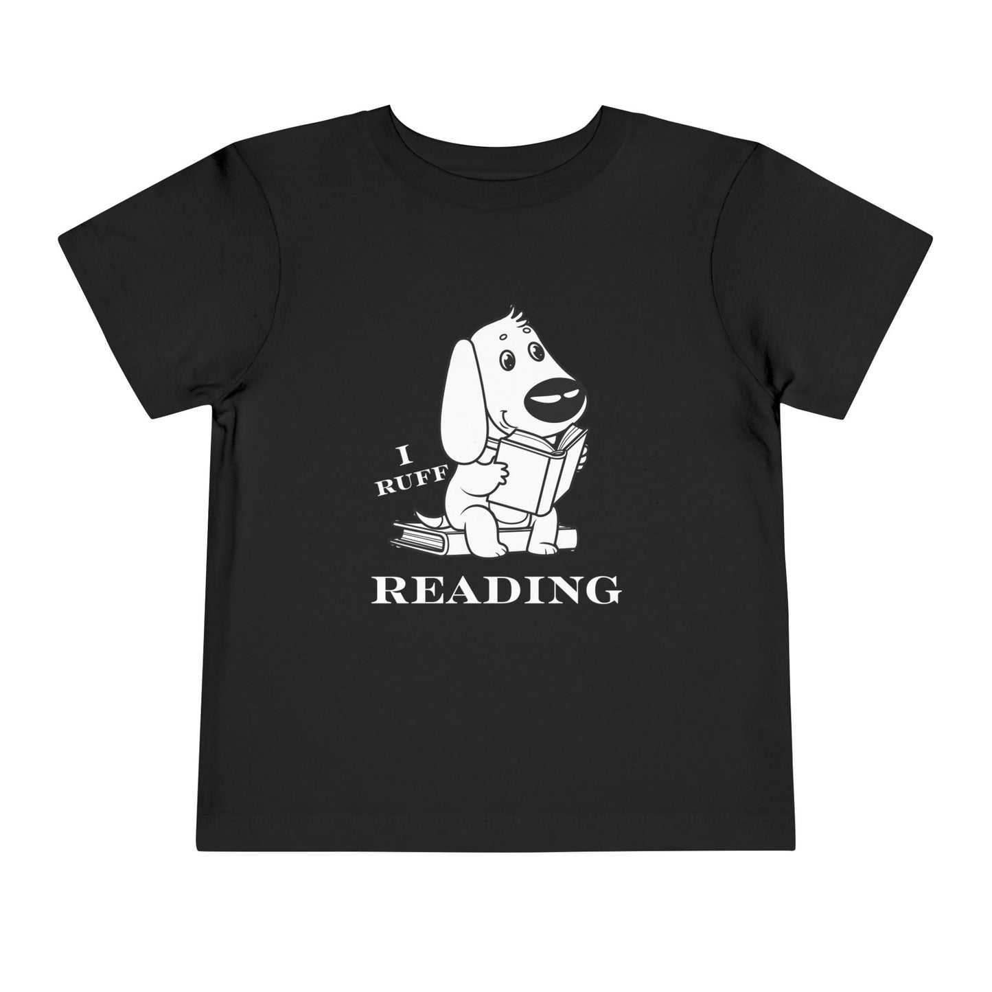 Black toddler t-shirt with black and white graphic of a dog reading a book and text 'I RUFF READING'