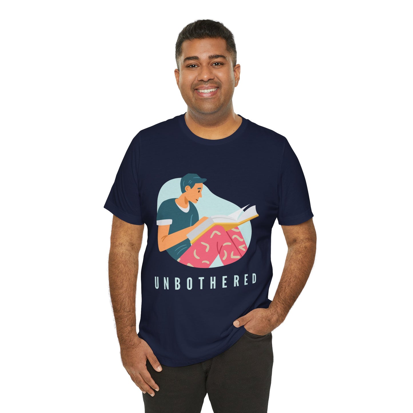 Man wearing a navy blue t-shirt with a man reading a book and 'UNBOTHERED' text 