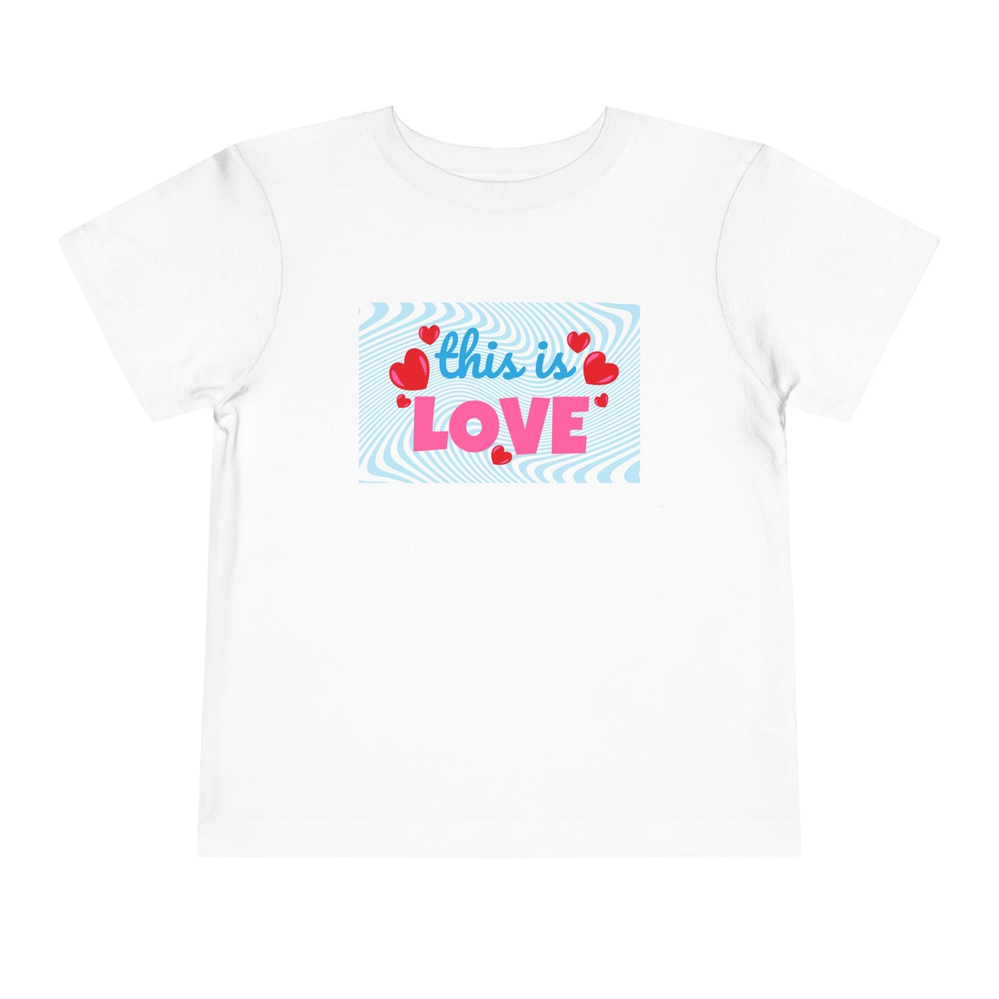 White t-shirt with 'this is LOVE' text and heart graphics on a swirling blue background