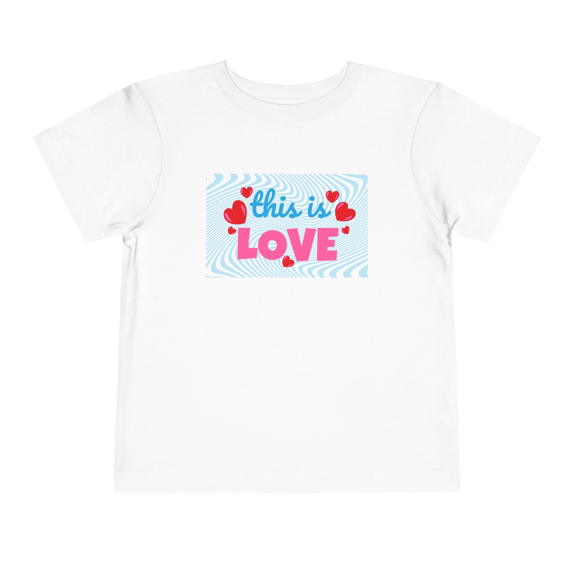 White t-shirt with 'this is LOVE' text and heart graphics on a swirling blue background