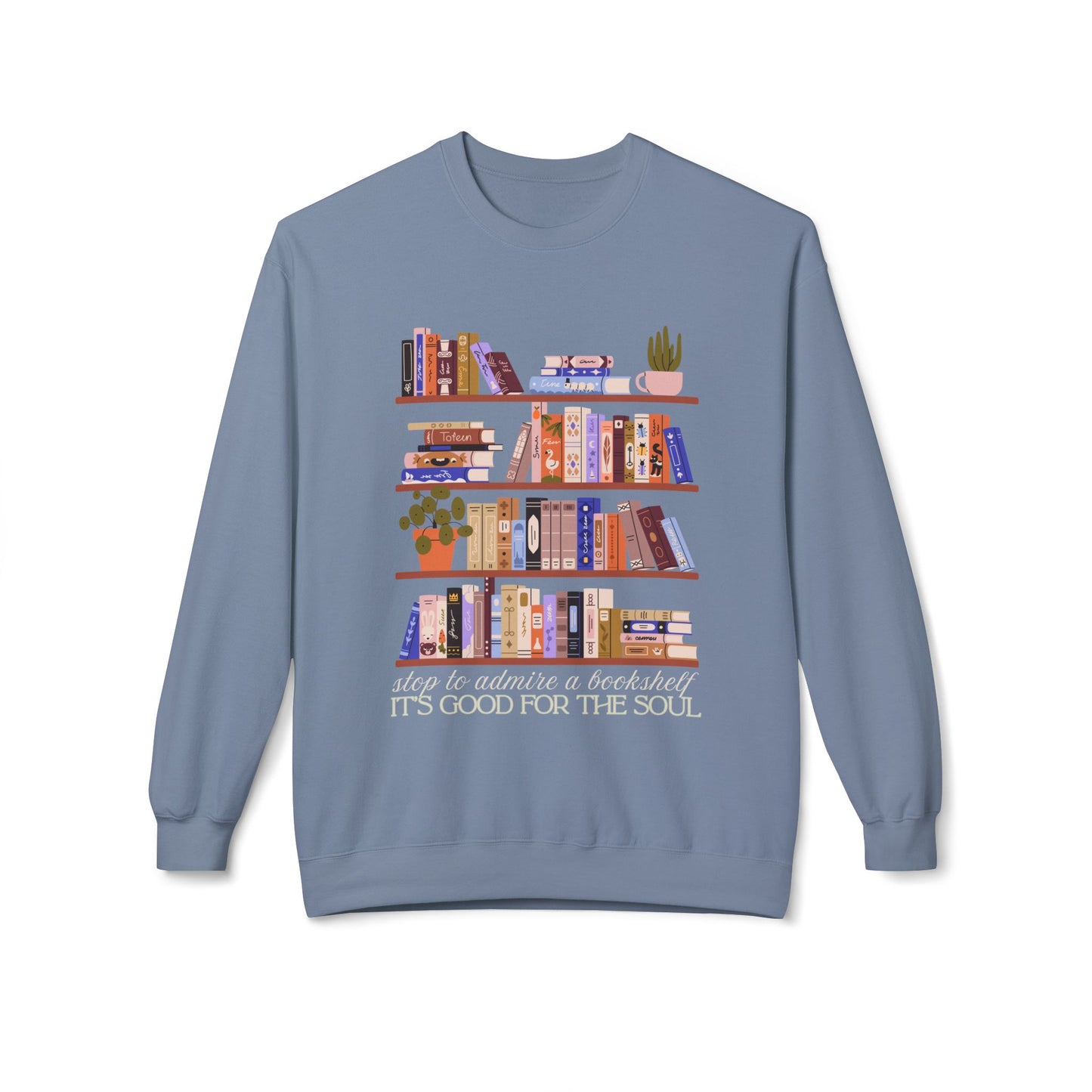 Blue gray sweatshirt with bookshelf design and text 'Stop to admire a bookshelf, it's good for the soul'