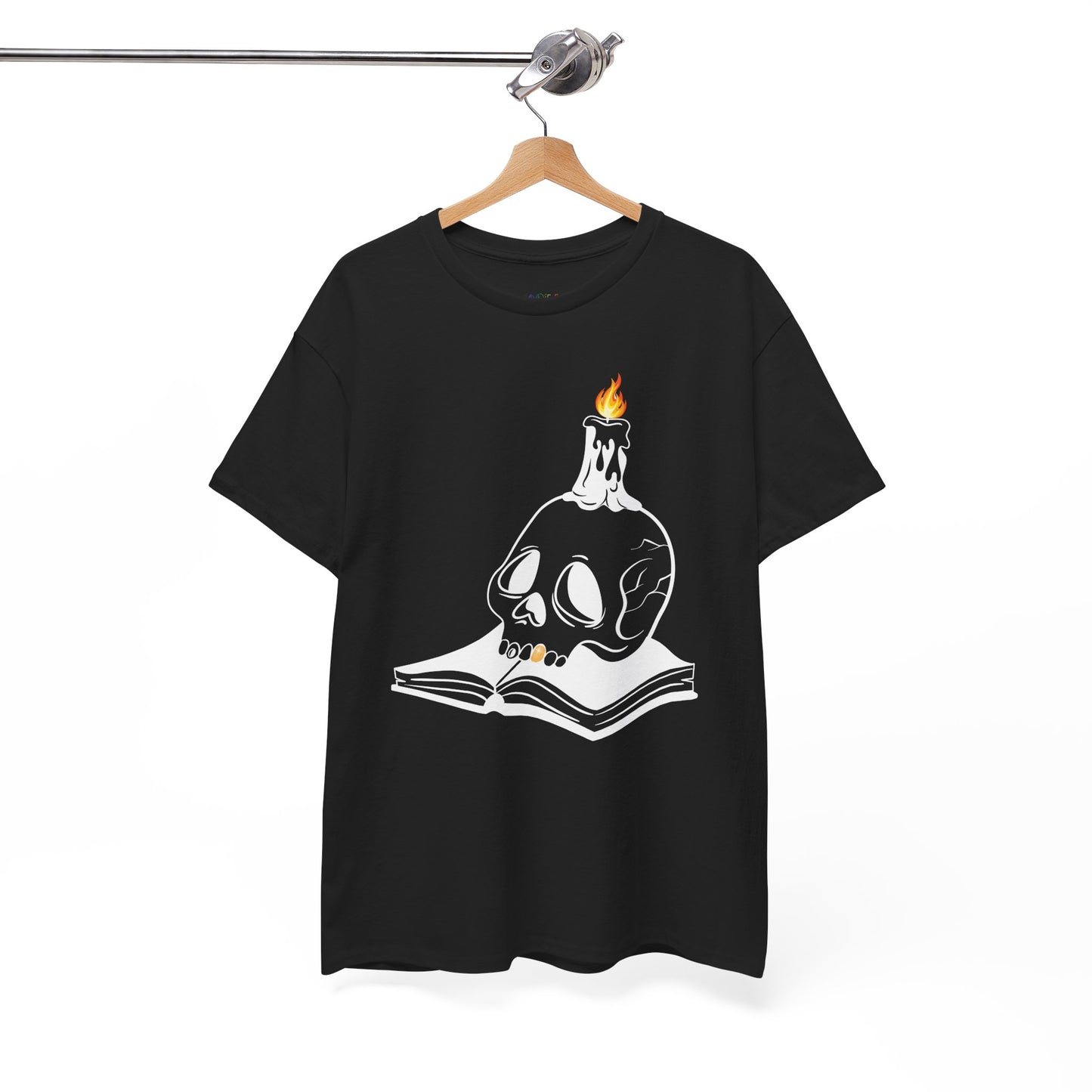 Black t-shirt with a graphic design of a skull and candle on an an open book