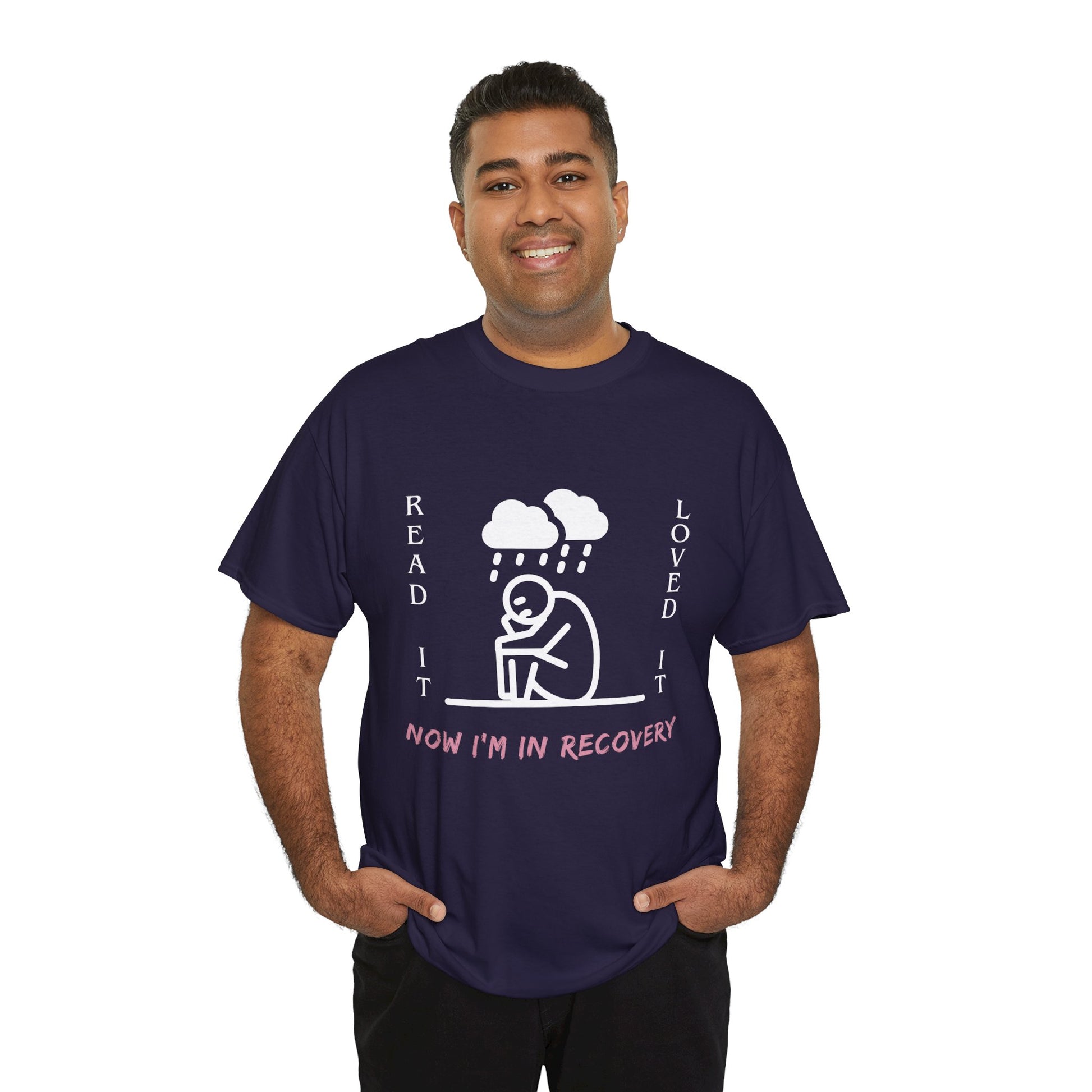 Man wearing a dark (blackberry) t-shirt with a white graphic of a sad stick figure sitting under a cloud and text 'Read It. Loved It. Now I'm In Recovery.' 