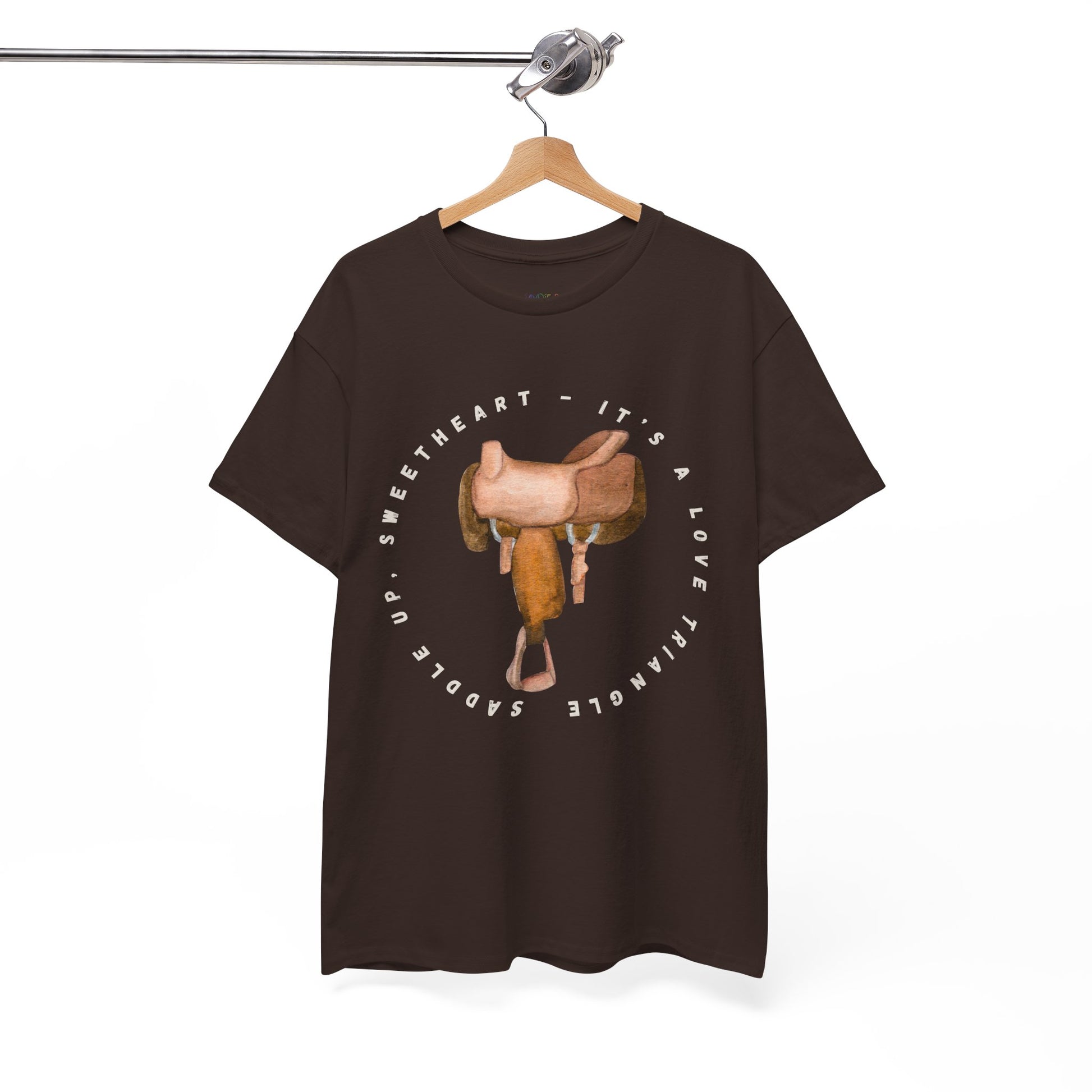 Brown t-shirt with a saddle graphic and text 'Saddle Up Sweetheart - It's a Love Triangle'