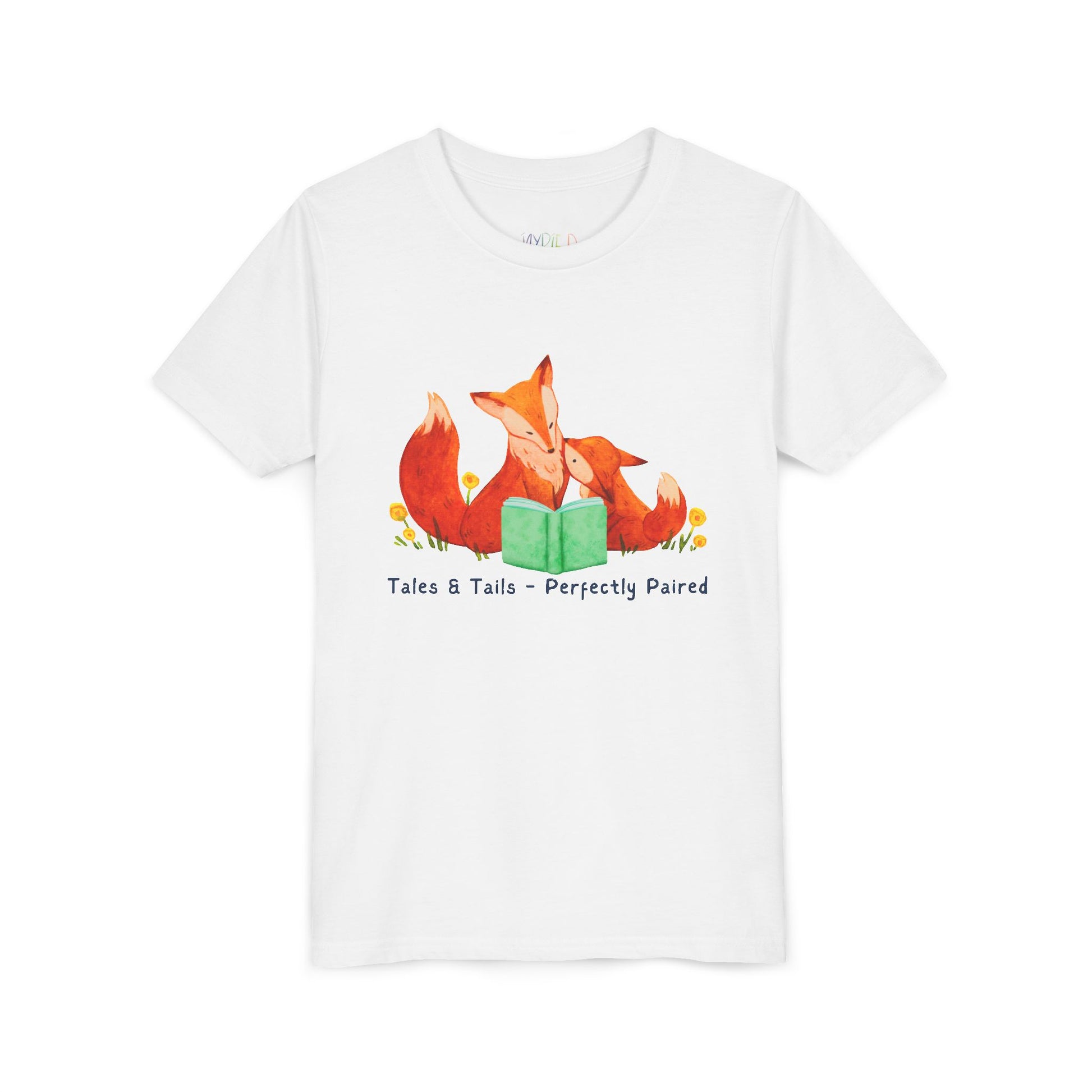 White t-shirt with fox family reading a book and text 'tales & tails - perfectly paired'