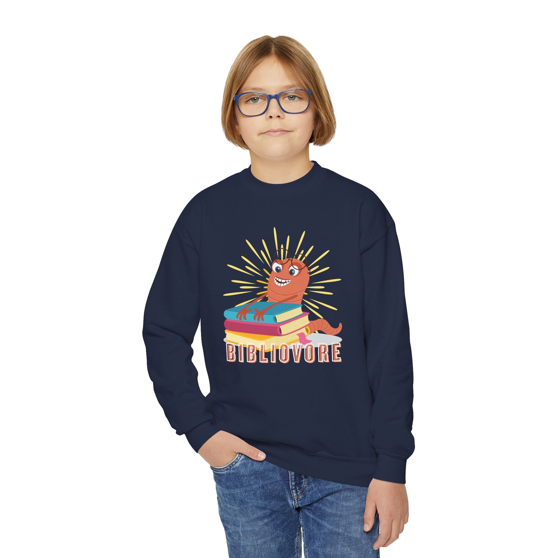 Boy wearing a navy blue sweatshirt with a worm hugging a stack of books and text 'Bibliovore'