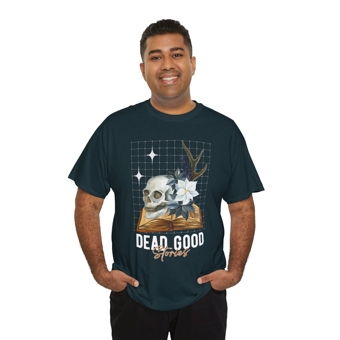 Man wearing a midnight t-shirt with skull, antler, and flower on a book with text 'Dead Good Stories' on a hanger against a white background