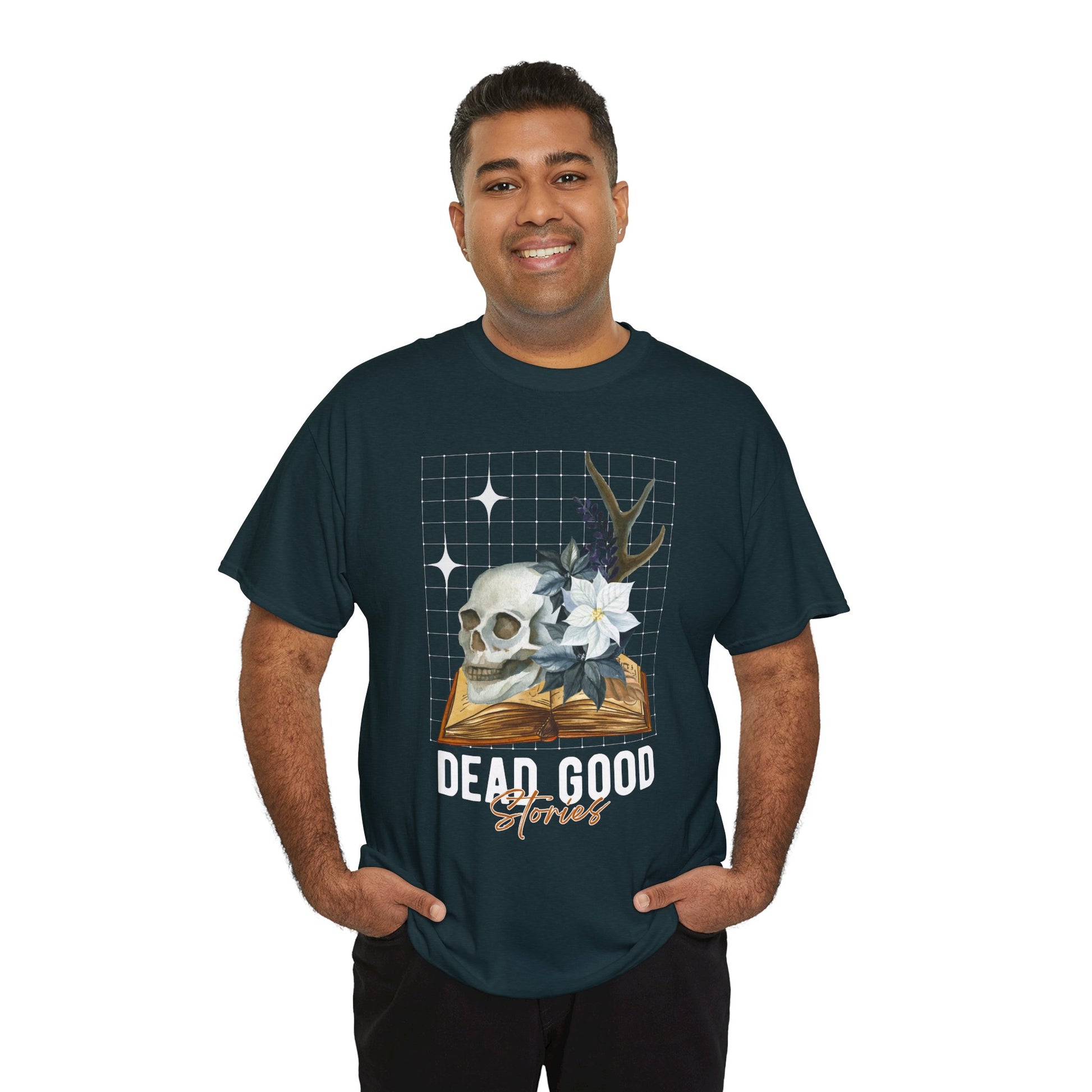 Man wearing a midnight t-shirt with skull, antler, and flower on a book with text 'Dead Good Stories' on a hanger against a white background