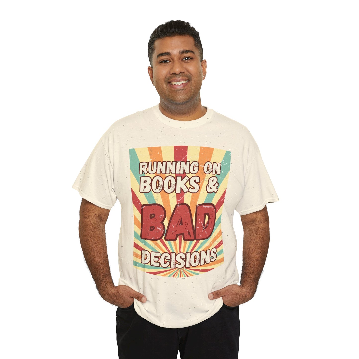 Man wearing a beige t-shirt with colorful retro burst strip graphic and text 'Running on Books & Bad Decisions' 