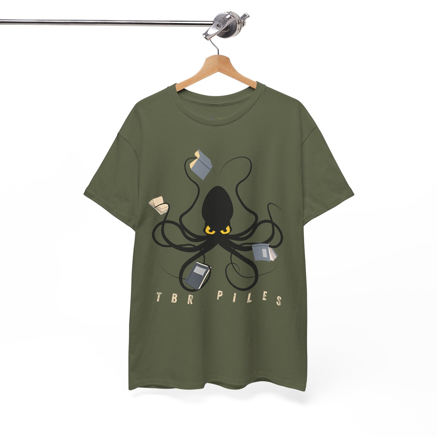 Army green t-shirt with a yellow eyed black octopus  holding several books and text 'TBR PILES' 