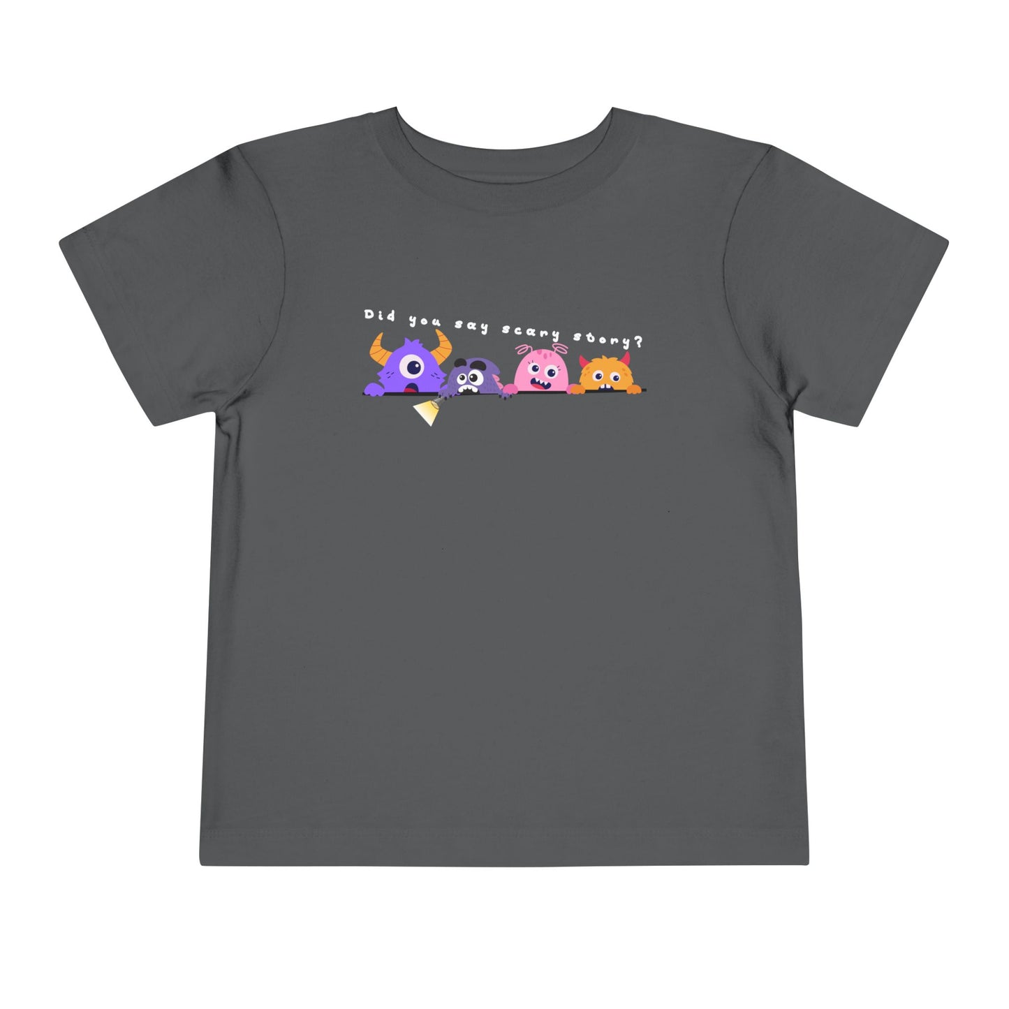 Gray t-shirt with a row of scared cartoon monsters peeking over a ledge and text 'Did You Say Scary Story?'