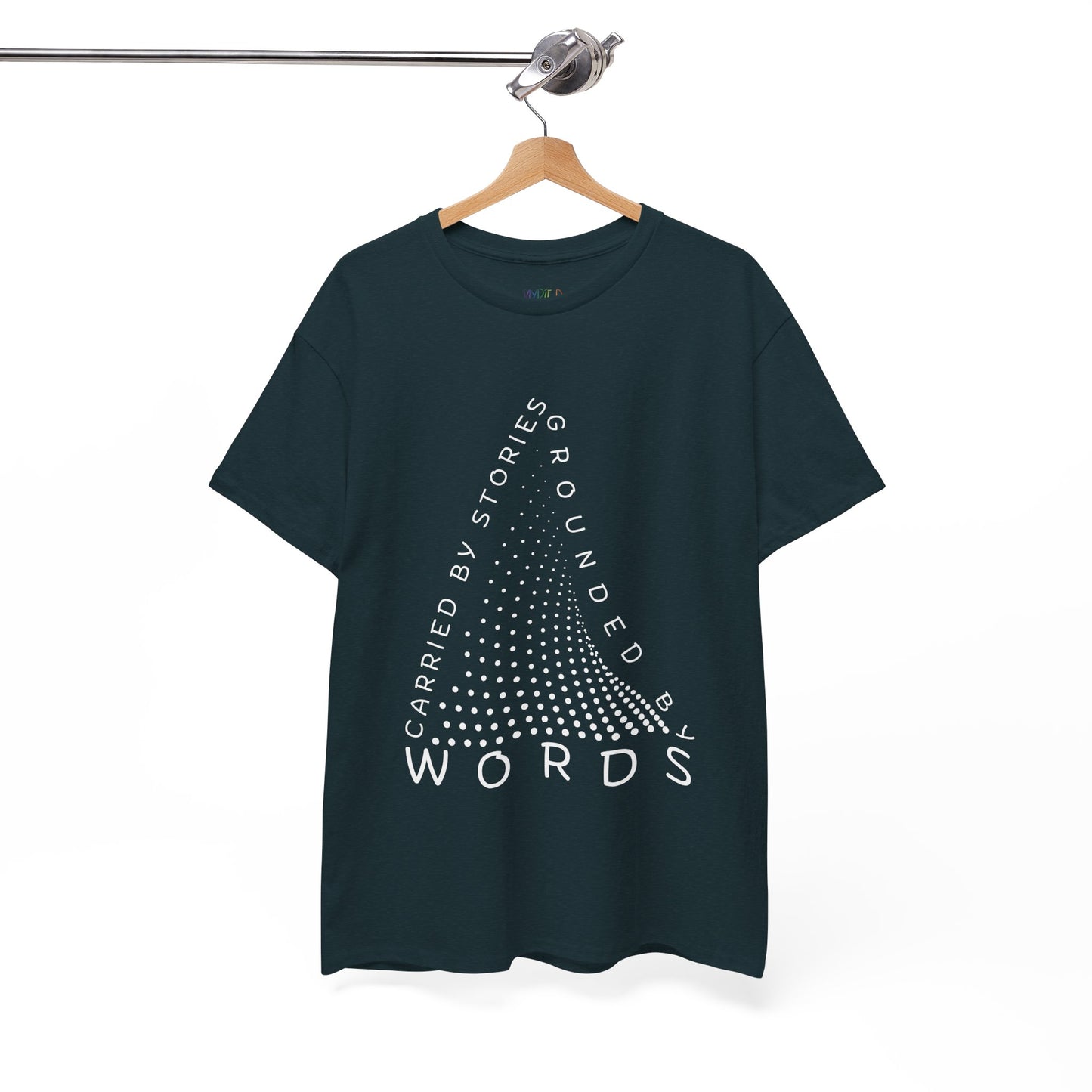 Midnight t-shirt with white text that follow the outline of a dotted triangle 'Carried By Stories, Grounded By Words' 