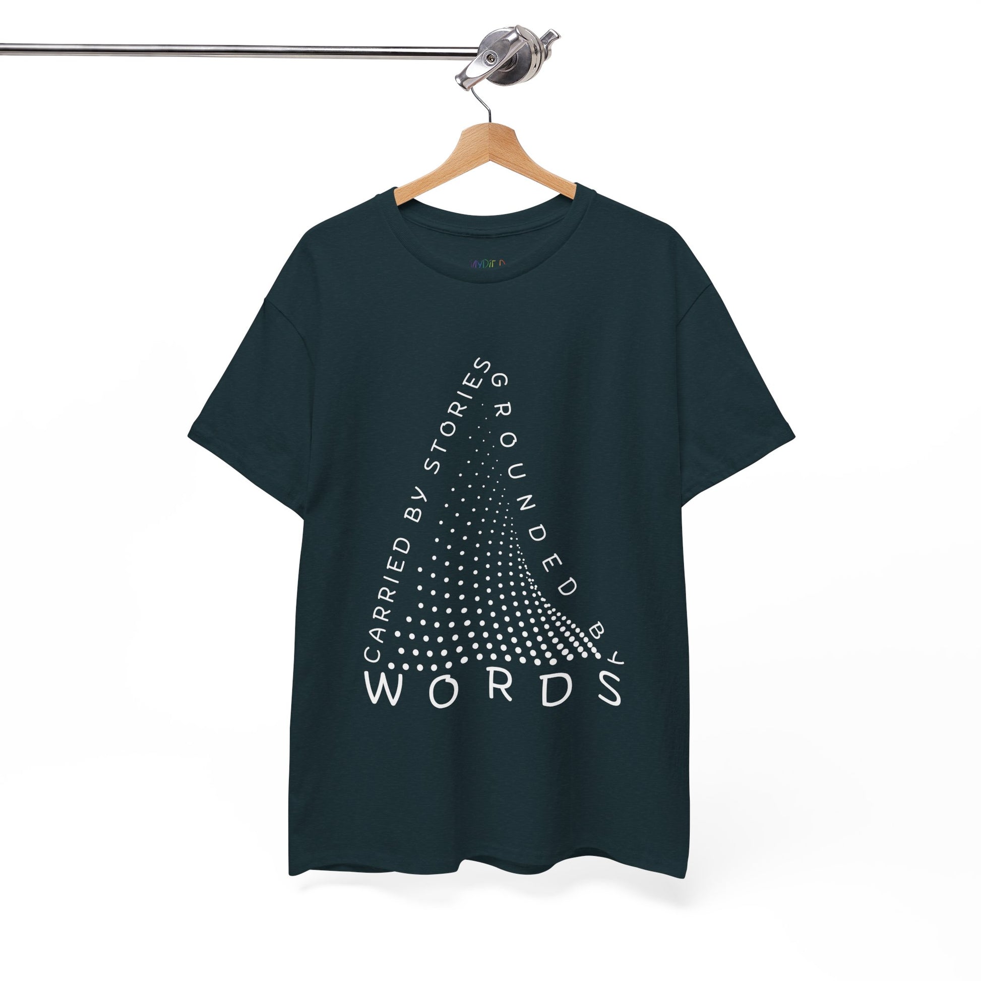 Midnight t-shirt with white text that follow the outline of a dotted triangle 'Carried By Stories, Grounded By Words' 