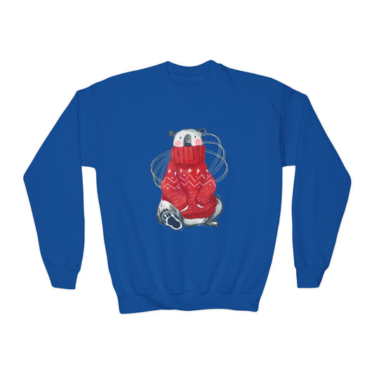 Blue sweatshirt with a graphic of a polar bear wearing a red sweater on a white background