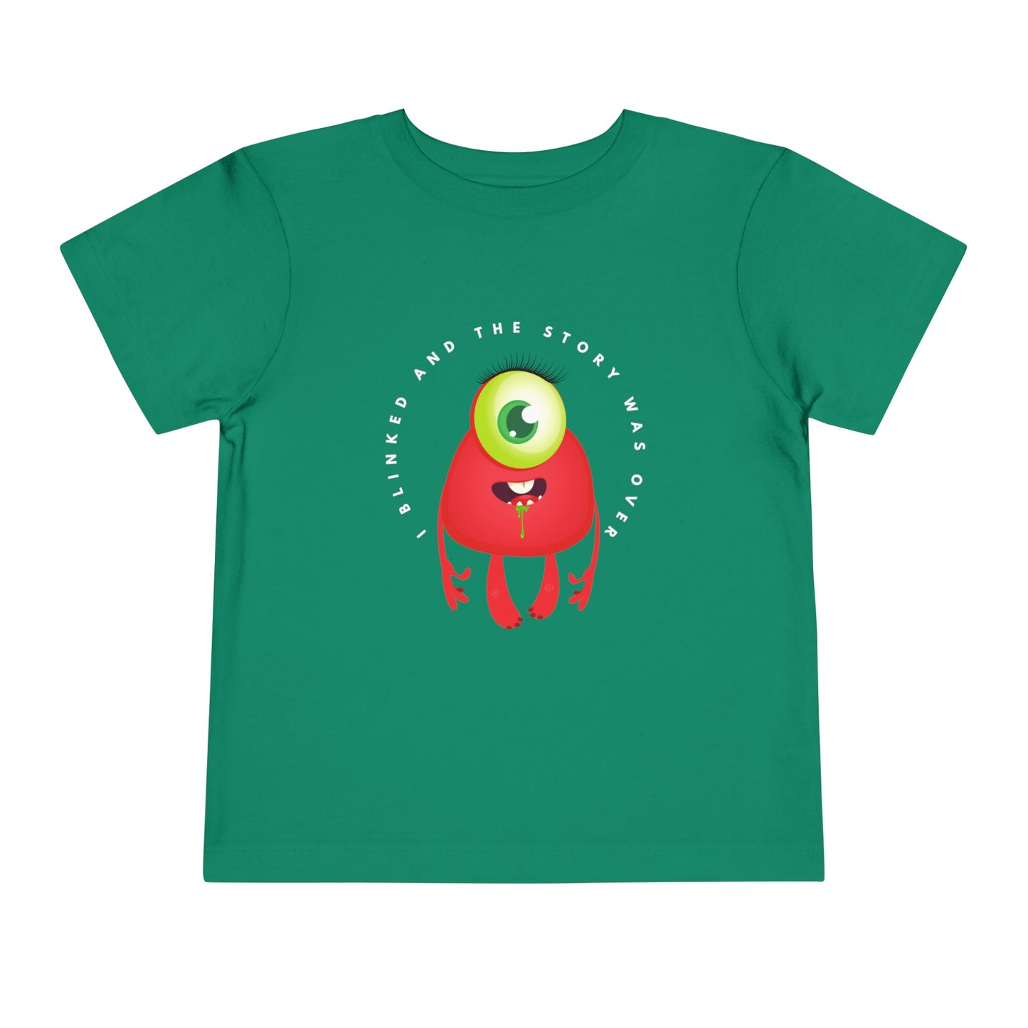 Green toddler t-shirt with a drooling, one eyed, red monster graphic and text 'I blinked and the story was over'