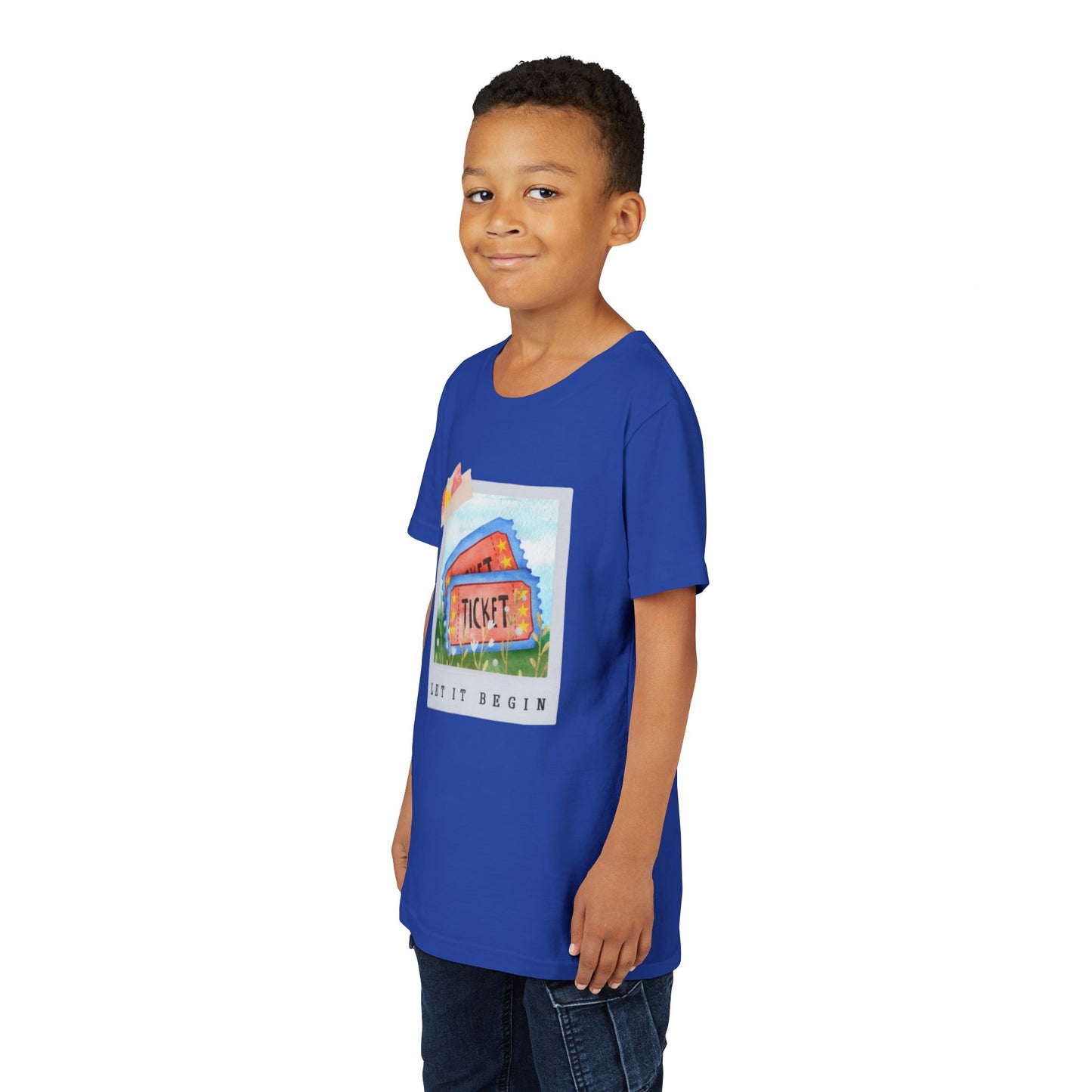 Boy wearing a blue t-shirt with a polaroid of two tickets and text 'Let It Begin' 