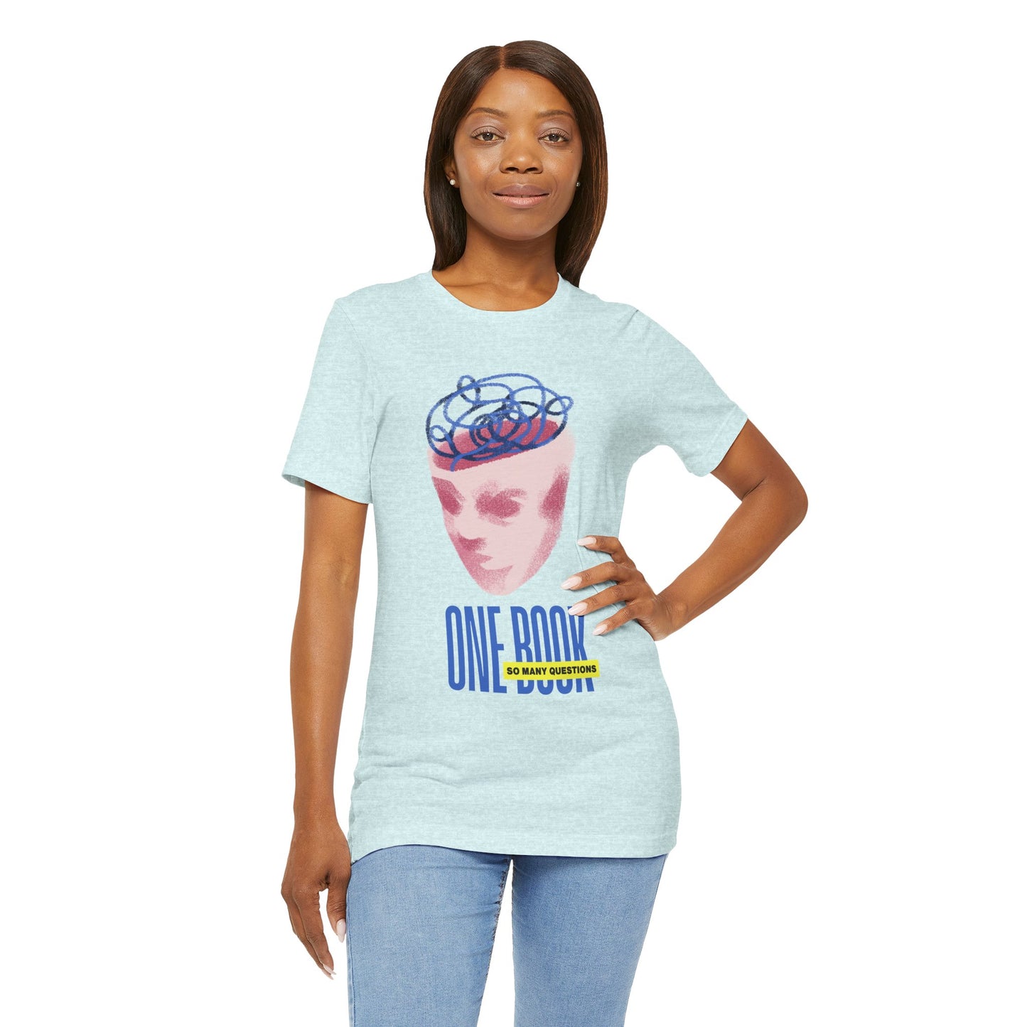 Woman wearing a light ice blue t-shirt with a pink face/head graphic, blue swirls coming out of the top and text 'One Book So Many Questions'