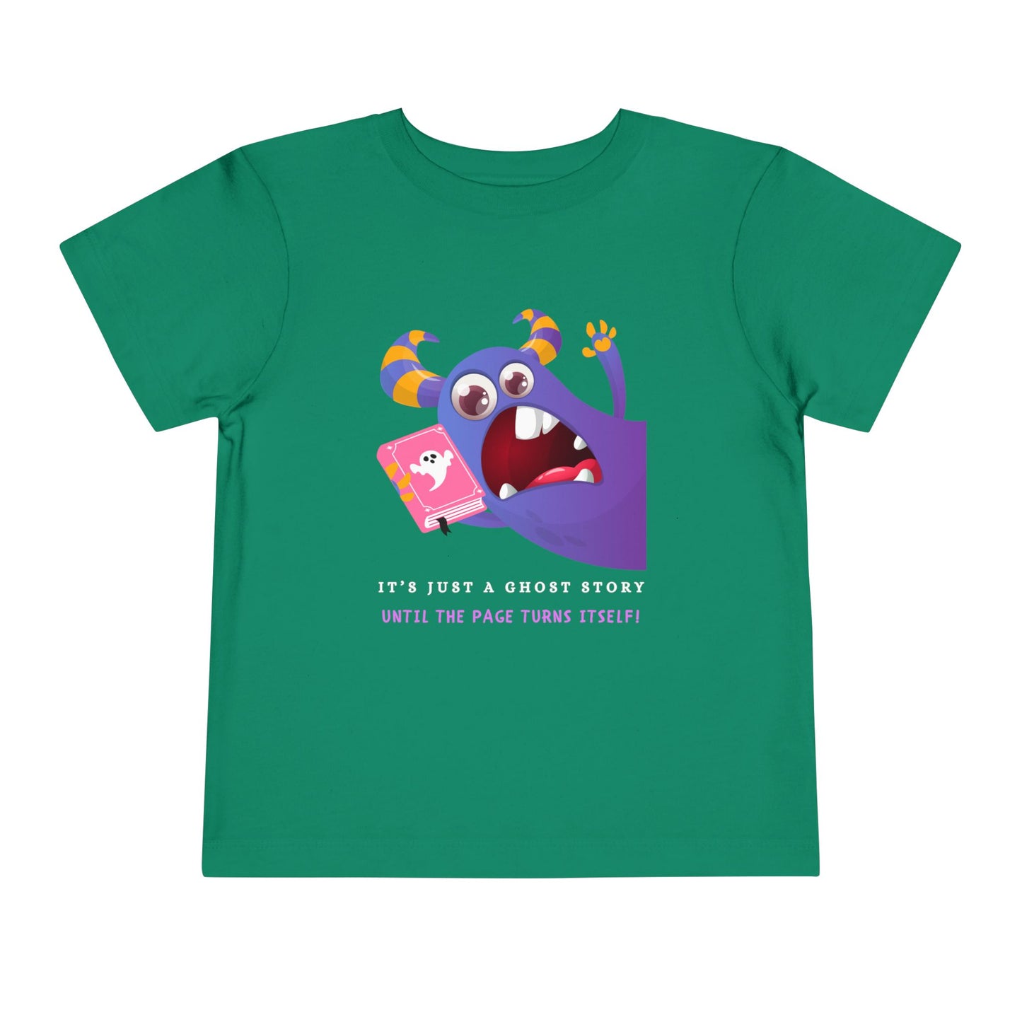 Green toddler t-shirt with a scared purple monster holding a pink ghost book and text 'It's just a ghost story until the page turns itself!'