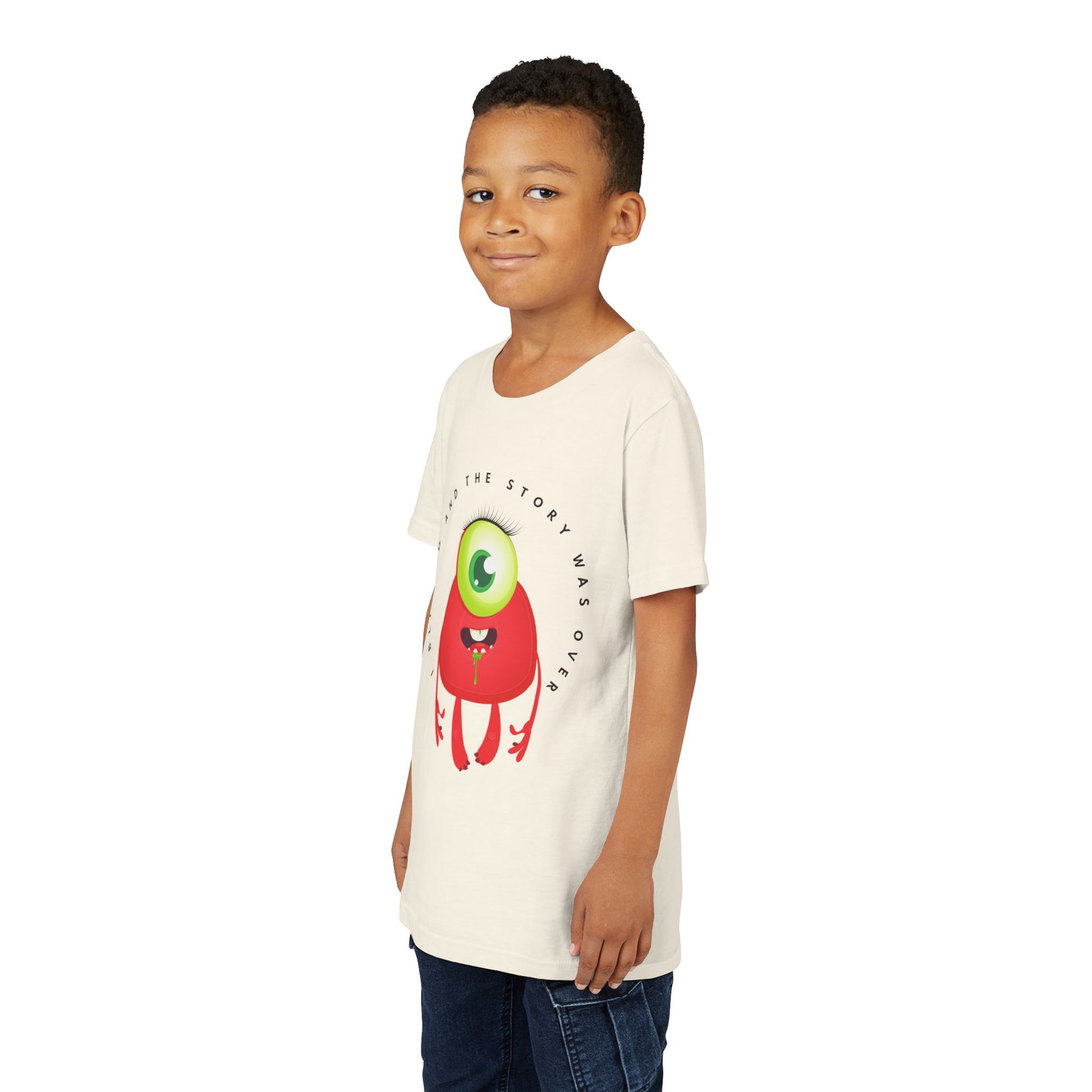 Boy wearing a beige t-shirt with a one eye, red, drooling monster and text 'I Blinked And The Story Was Over' 