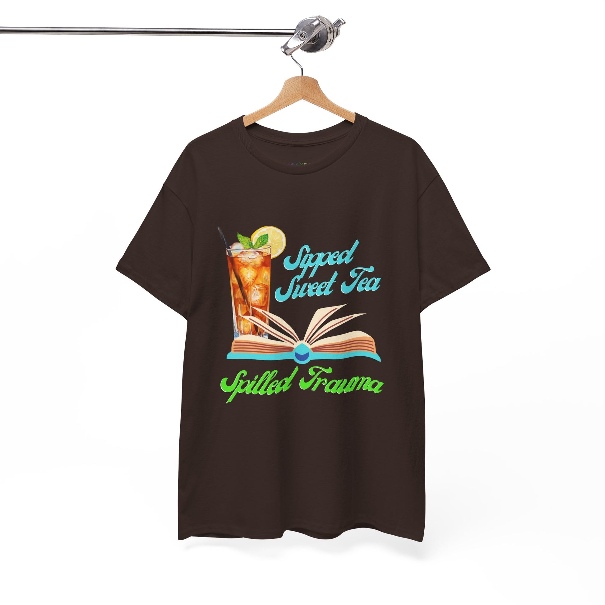 Brown t-shirt with a graphic design of a  sweet ice tea, an open book and text 'Sipped Sweet Tea, Spilled Trauma'