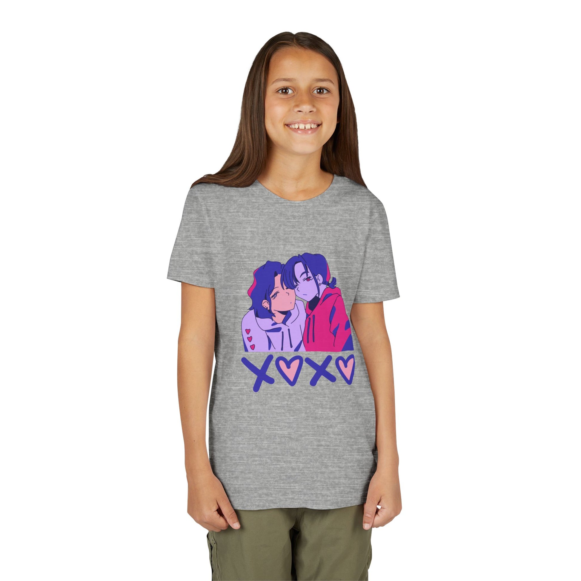 Girl wearing a gray t-shirt with two cartoon characters snuggled up and 'XOXO' text 