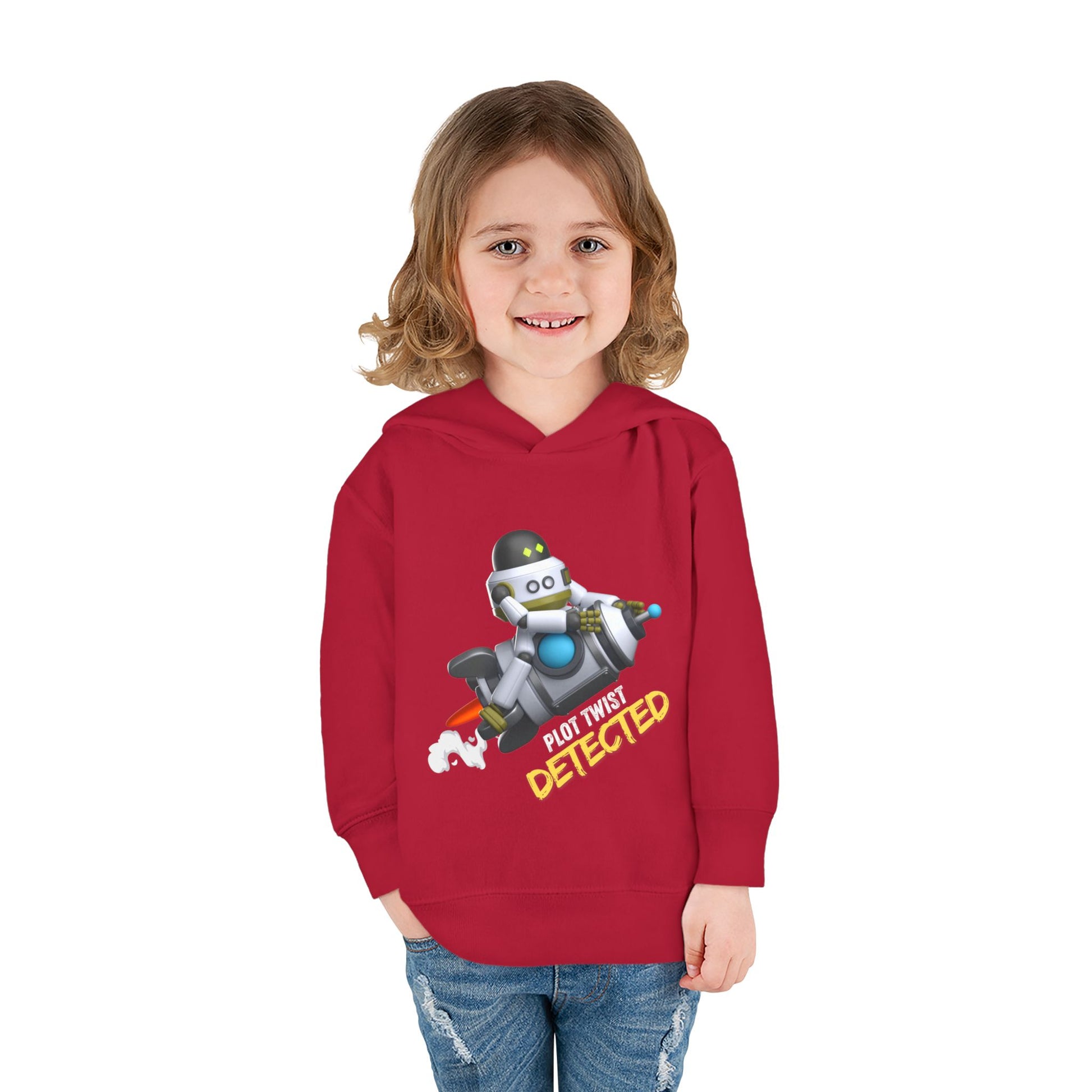 Girl wearing a red toddler hoodie featuring a robot riding a rocket and text 'plot twist detected' on white background