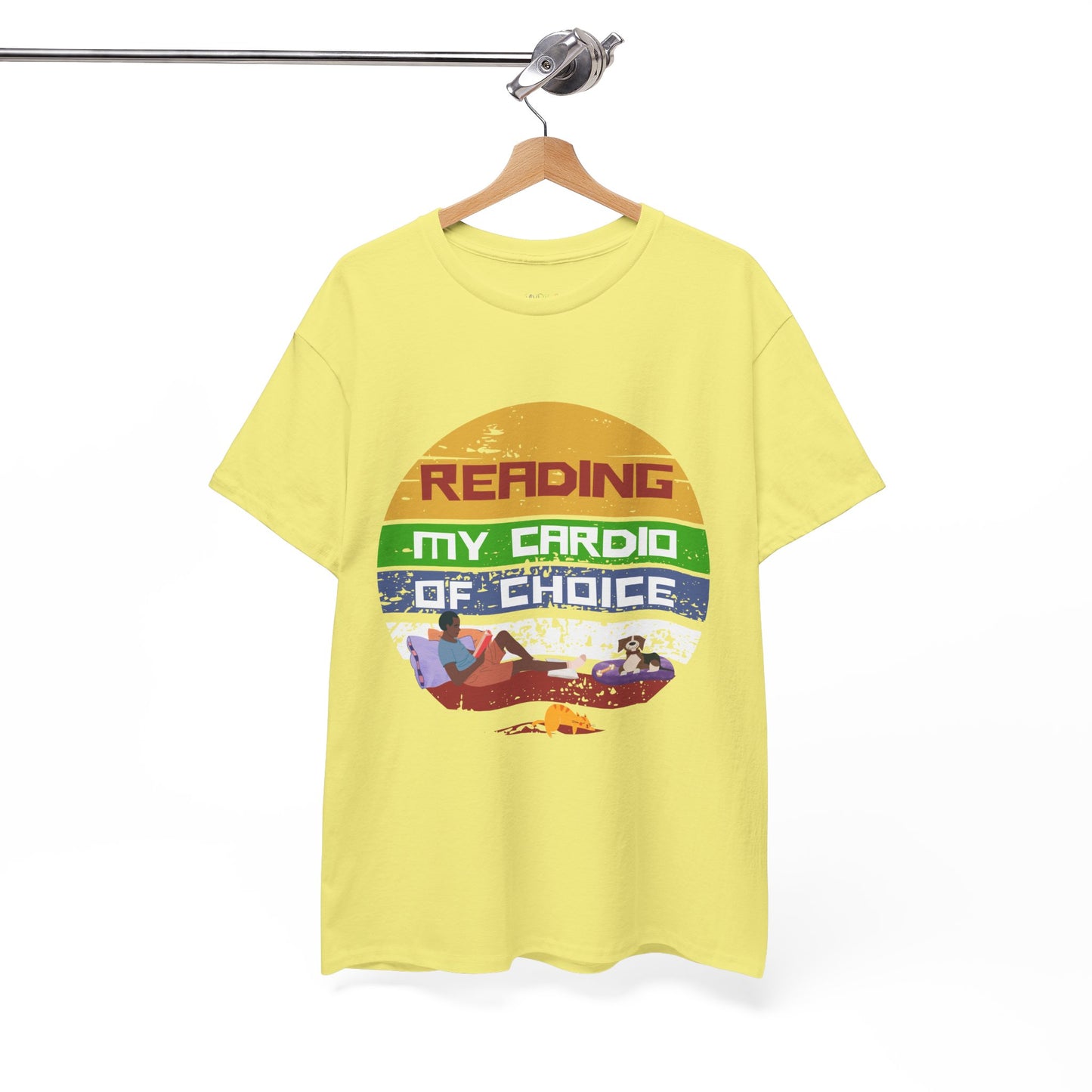 Yellow retro t-shirt with a colorful striped circle featuring a man reading a book alongside his dog and cat, and text 'Reading, My Cardio Of Choice' 