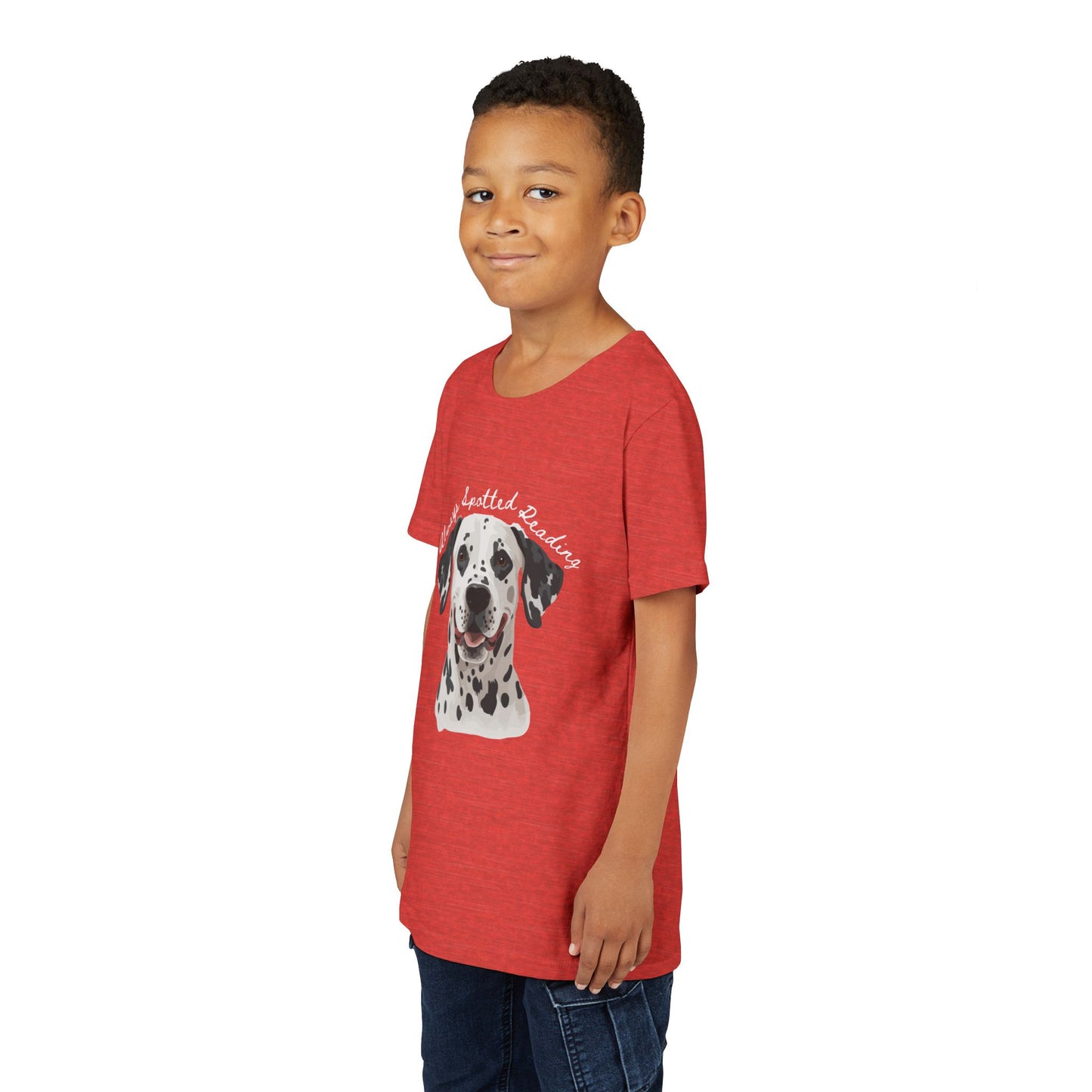 Boy wearing a red t-shirt with a Dalmatian dog graphic and text 'Always Spotted Reading'
