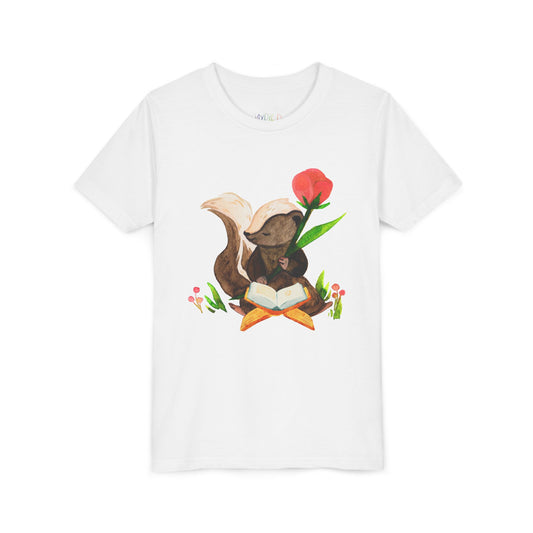 White t-shirt with a graphic of a skunk reading a book in a patch of flowers