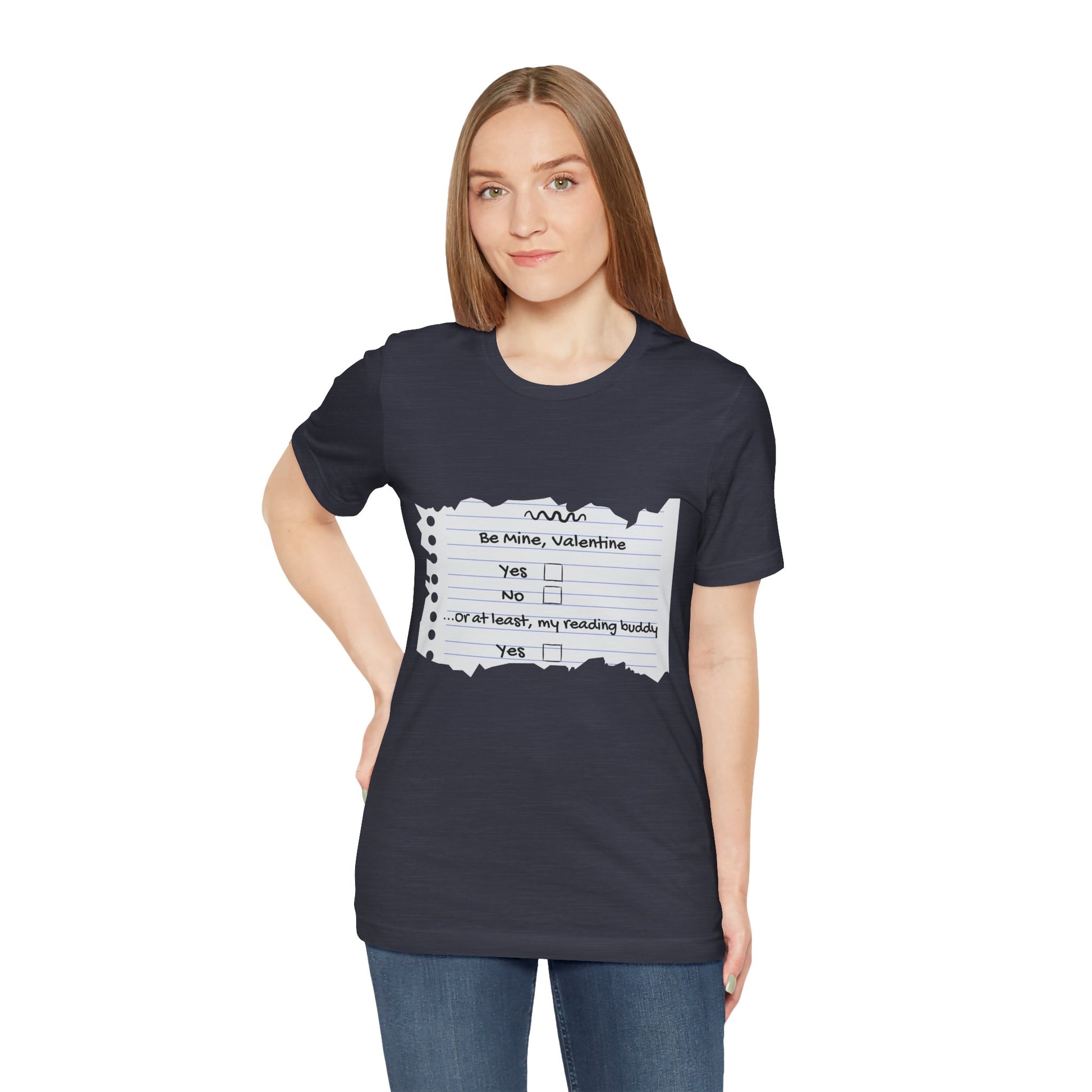 Woman wearing a navy blue t-shirt with an image of torn notebook paper and old school checkboxes depicting 'Be Mine Valentine, Yes, No' and 'Or At Least , My Reading Buddy, Yes'